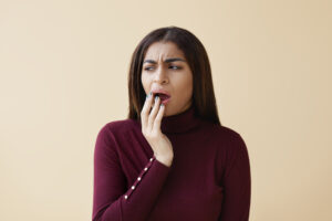A female suffering from periodontal disease